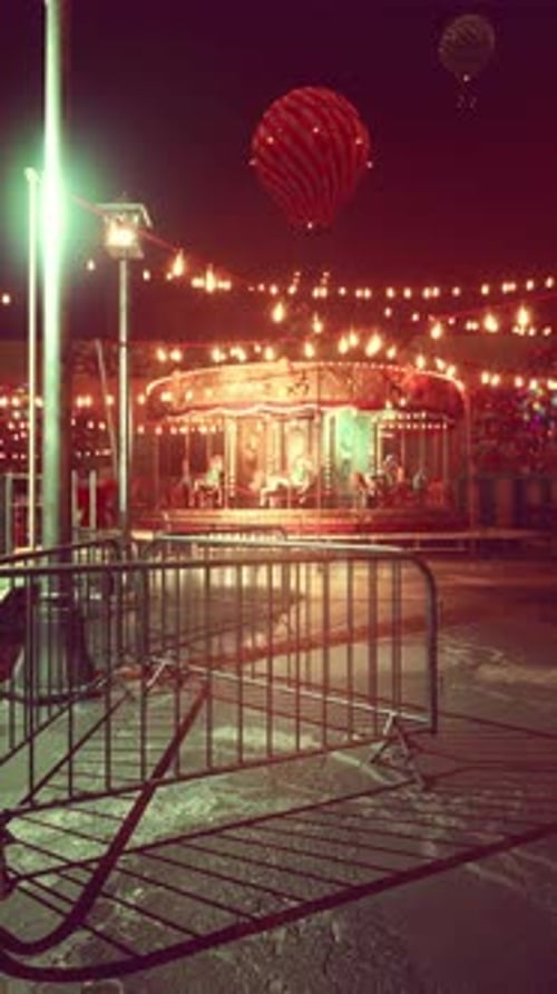 Retro Night Fairground with Carousel and Hot Air Balloon