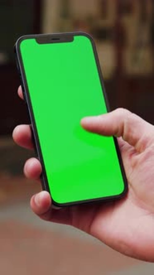 This Smartphone Features a Green Screen Ideal for App Development and Showcasing Creativity