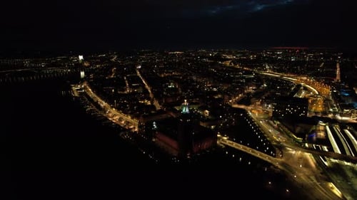 Beautiful aerial shot of illuminated buildings in the city at night