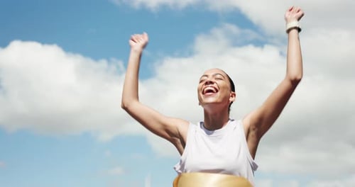 Smiling Woman Runner Cheers After Race Victory Outdoors