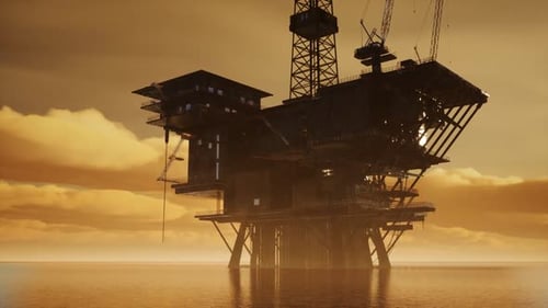 Offshore Jack Up Rig mitten im Meer bei Sonnenuntergang