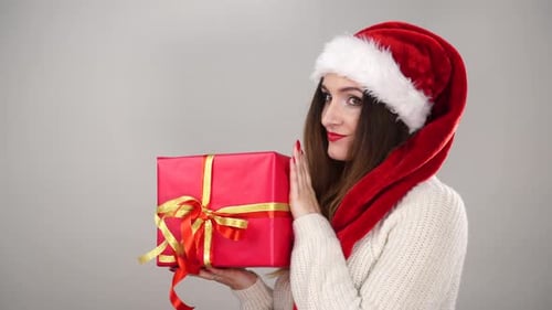 Woman Holding Gift Box For Christmas