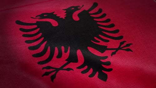 Textured Albanian Flag Waving with Double-Headed Eagle