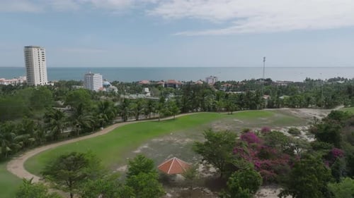 Aerial View of Coastal City and Golf Course