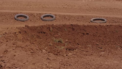 Motocross racers speeding around a dirt track corner in intense 4k competition
