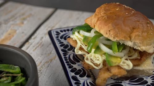 Two Tasty Mexican Tortas on Ornate Plates