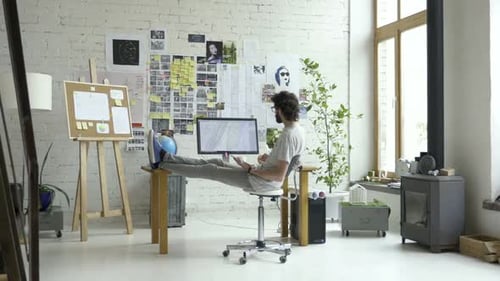 Man Working From Home in Bright Room
