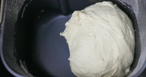 Dough Being Mixed in Bread Machine