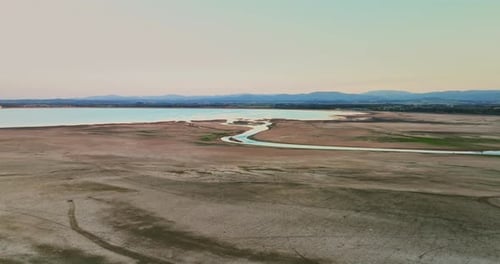 River Flowing Into a Lake Drying Water Source