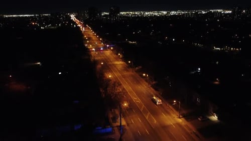 Aerial View Of Fire Truck Responding To Accident At The Road Intersection At Night In Toronto, Ontar