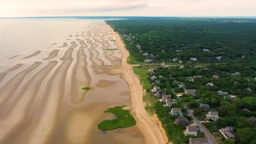 Aerial View of Beachfront Homes and Striated Sand