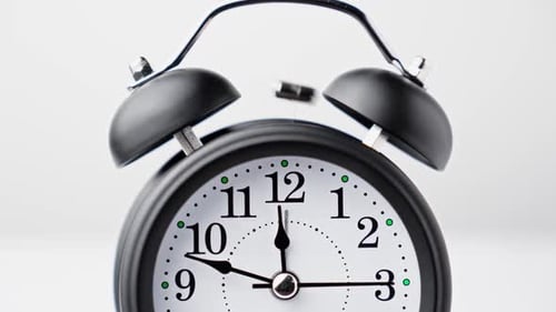 Alarm Clock Ringing Showing Time Ticking By