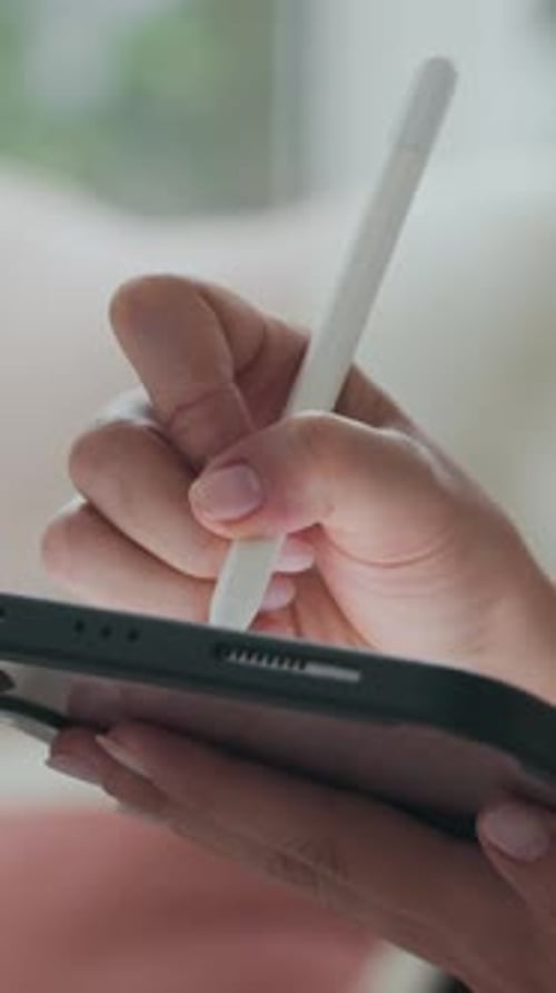 Hand Drawing on Tablet with Stylus Close Up