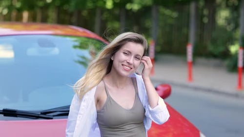 Close Up Portrait of Young Beautiful Woman Smiling and Looking at Camera at Her Car