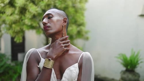 Stylish Person Posing in Fashionable Gown Outdoors