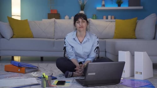 Home office worker woman looking emotional at camera.
