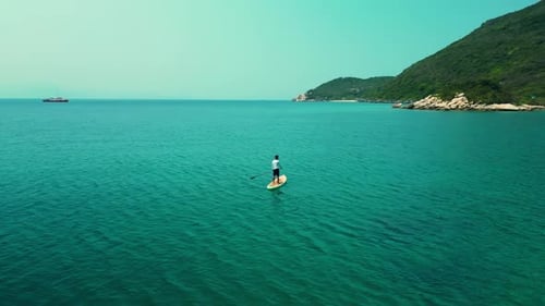 Man Doing Water Sport During Summer Holidays Concept of Active Tourism and Travel Aerial View of a