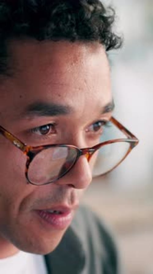 Man, glasses and review at office, startup and insight with project management at media company