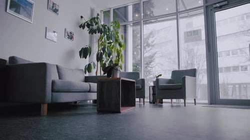 Very slow push in - Slider shot of an empty office entrance.