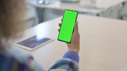 Close Up of Young African Woman Using Phone with Green Screen