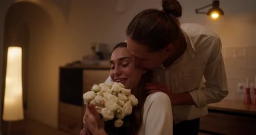 Romantic Couple Celebrating with Roses and Kisses