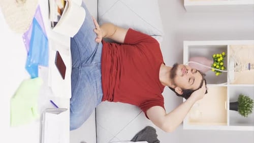 Man on Couch Ponders Problems