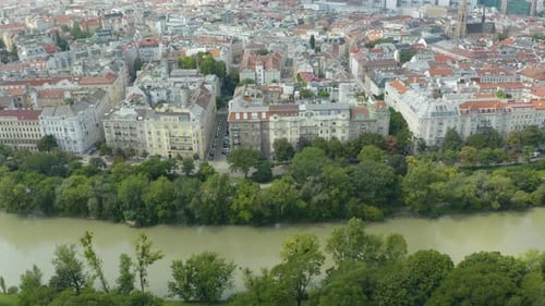 Aerial view flying forward. Flying above the city of Vienna, Austria. View of the skyline with house