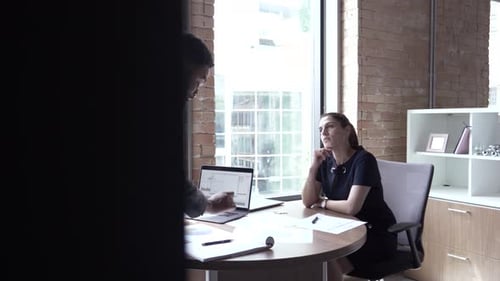 Business teamwork and collaboration in modern office with south asian man