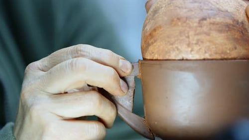 Working With Clay In Ceramic Workshop 21