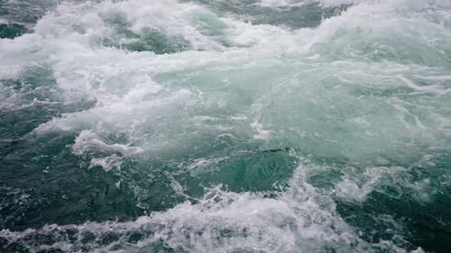 Slow Motion of Wild Clear Mountain River Stream Flowing Through Rocks