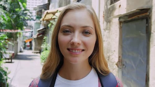 Smiling Backpacker Girl Portrait in Bangkok