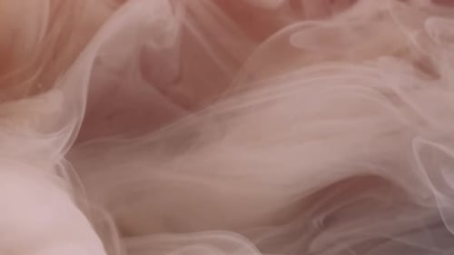 Abstract White Shapes Motion in Pinkish Tan Liquid