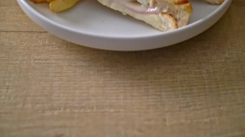 Delicious Sandwich with Ham and French Fries