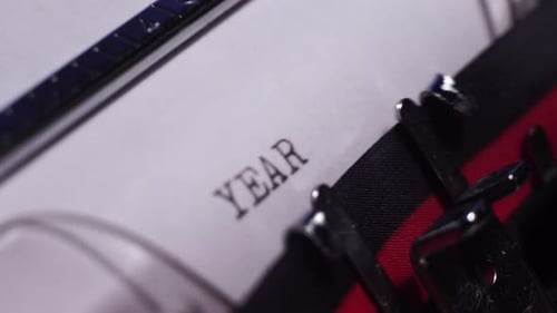 Year 1934, Typing on Blank White Paper in Vintage Typewriter, Close Up