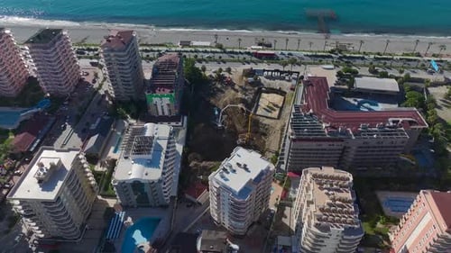 Aerial Video Coastal Cityscape Featuring Residential Buildings and the Mediterranean Sea Captured