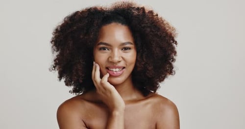 Skincare, face and beauty of happy woman with glow, dermatology or shine on white studio background