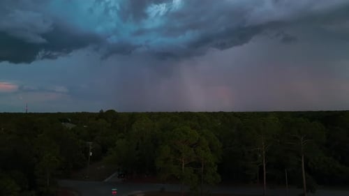 Dark Stormy Clouds Forming on Gloomy Sky Before Heavy Rainfall Over Suburban Town Area