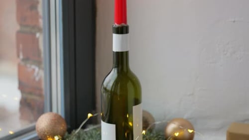 Christmas Garland with Wine Bottle Candle and Ornament