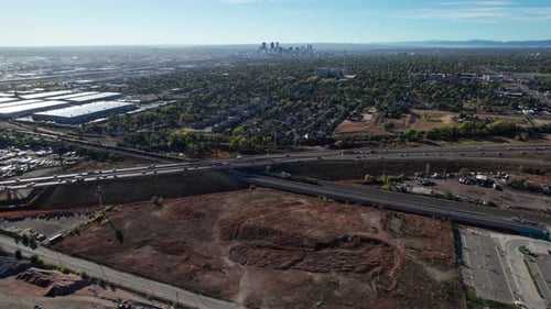 Drone shot panning up of a busy highway outside of Denver, Colorado