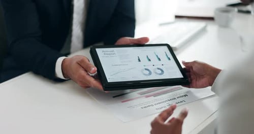 Business Meeting with Tablet in Office Setting