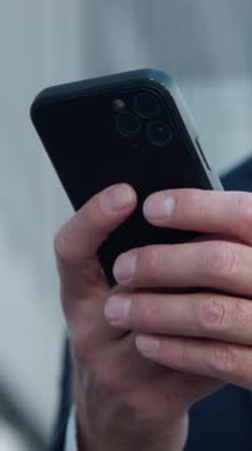 Closeup Unrecognizable Mature Business Man Holding Mobile Phone in City Unknown Businessman