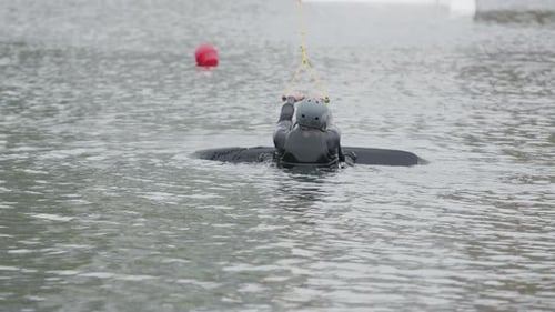 Wakeboarder Rising up from Water and Keep on Riding