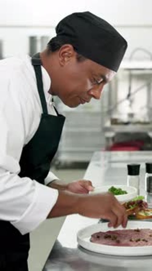 Culinary, plating or chef in restaurant with dish, catering or presentation in luxury cuisine