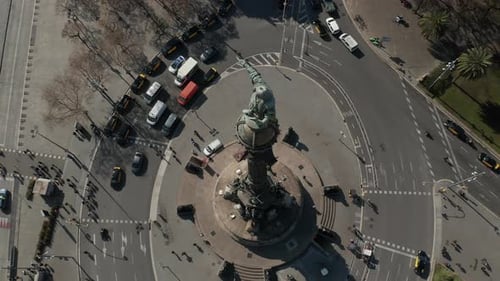 High Angle View of Columbus Monument and Vehicles Driving on Roundabout Around Column