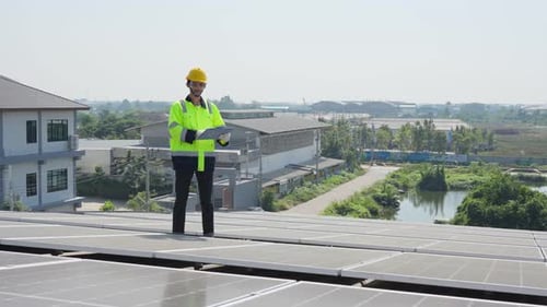 Professional engineer work to maintenance of photovoltaic panel system.