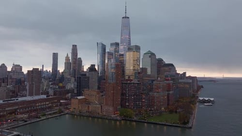 Aerial View Showcasing Lower Manhattan Skyline One World Trade Center Glowing at Twilight Revealing
