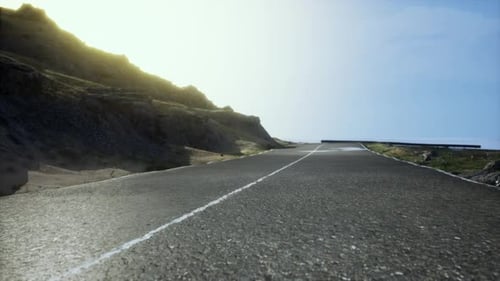 Scenic View of Empty Road Amidst Volcanic Landscape