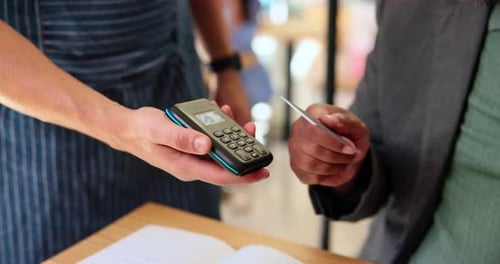 POS, hands or credit card on machine for payment with contactless transaction