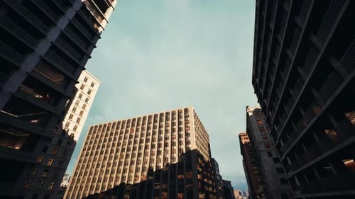 High Altitude Drone Captures Intricate Building Patterns Against Blue Sky