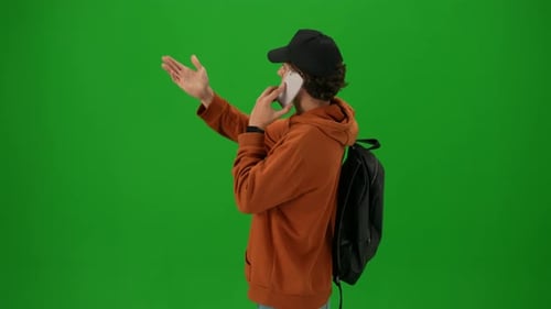 Portrait of Traveler Isolated on Chroma Key Green Screen Background Close Up of Man Checking